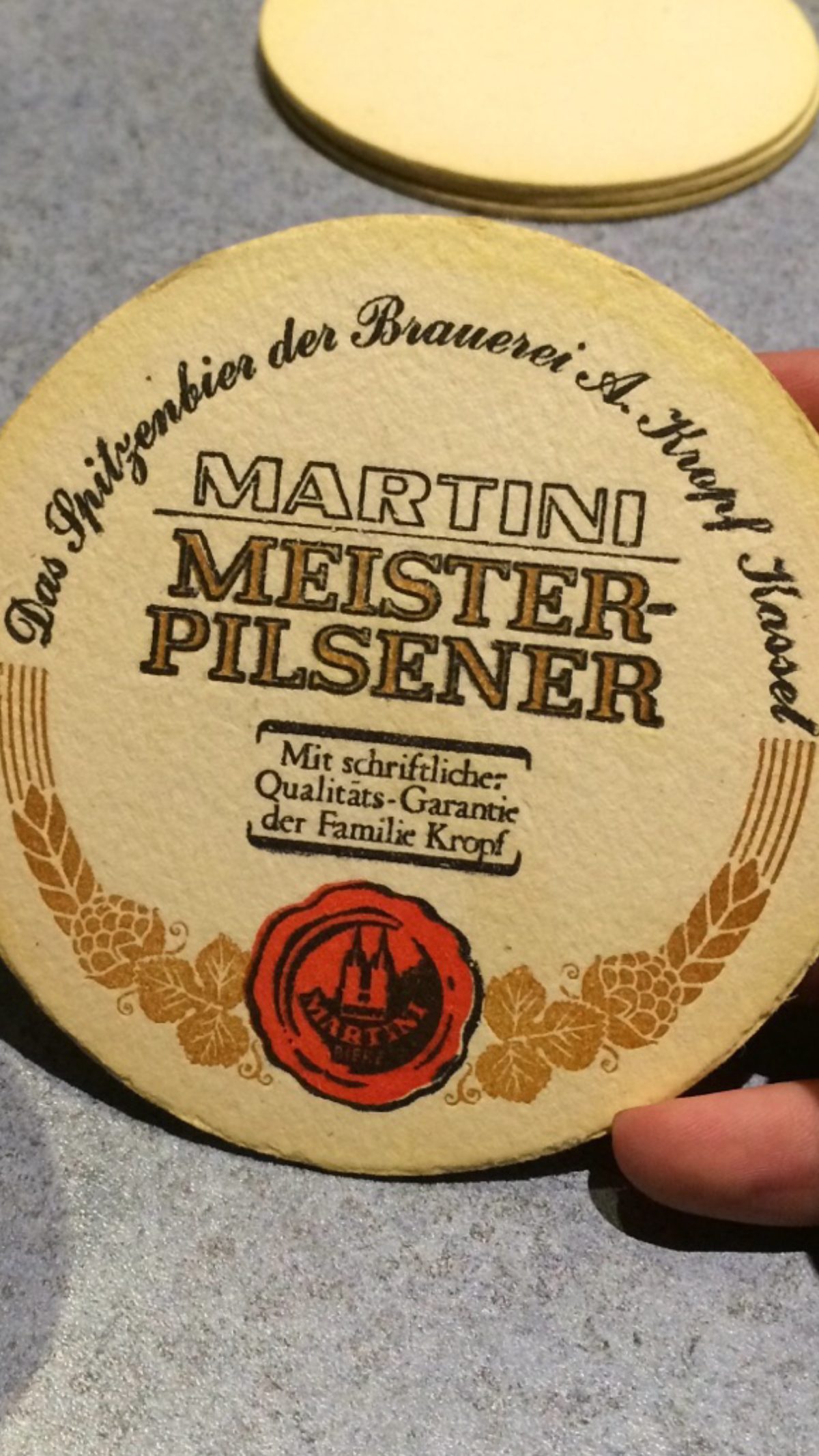 Bierdeckel „Qualitäts-Garantie der Familie Kropf“